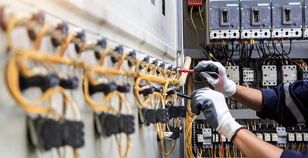 Professional Electrician technician working in Beechwood Trails, OH